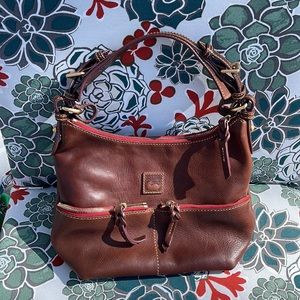 Brand New!! Dooney and Bourke shoulder leather bag.